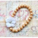 baby girl stretchable necklace with dusty pink pearls and white flower