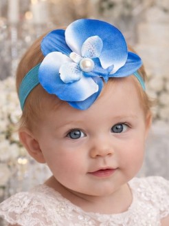 Elegant blue orchid baby headband close-up detail