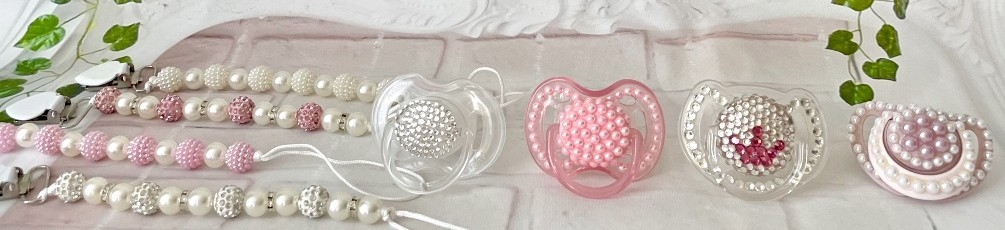 Luxury baby pacifiers with crystals and pearls handmade in the UK